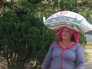 woman with bag of rice